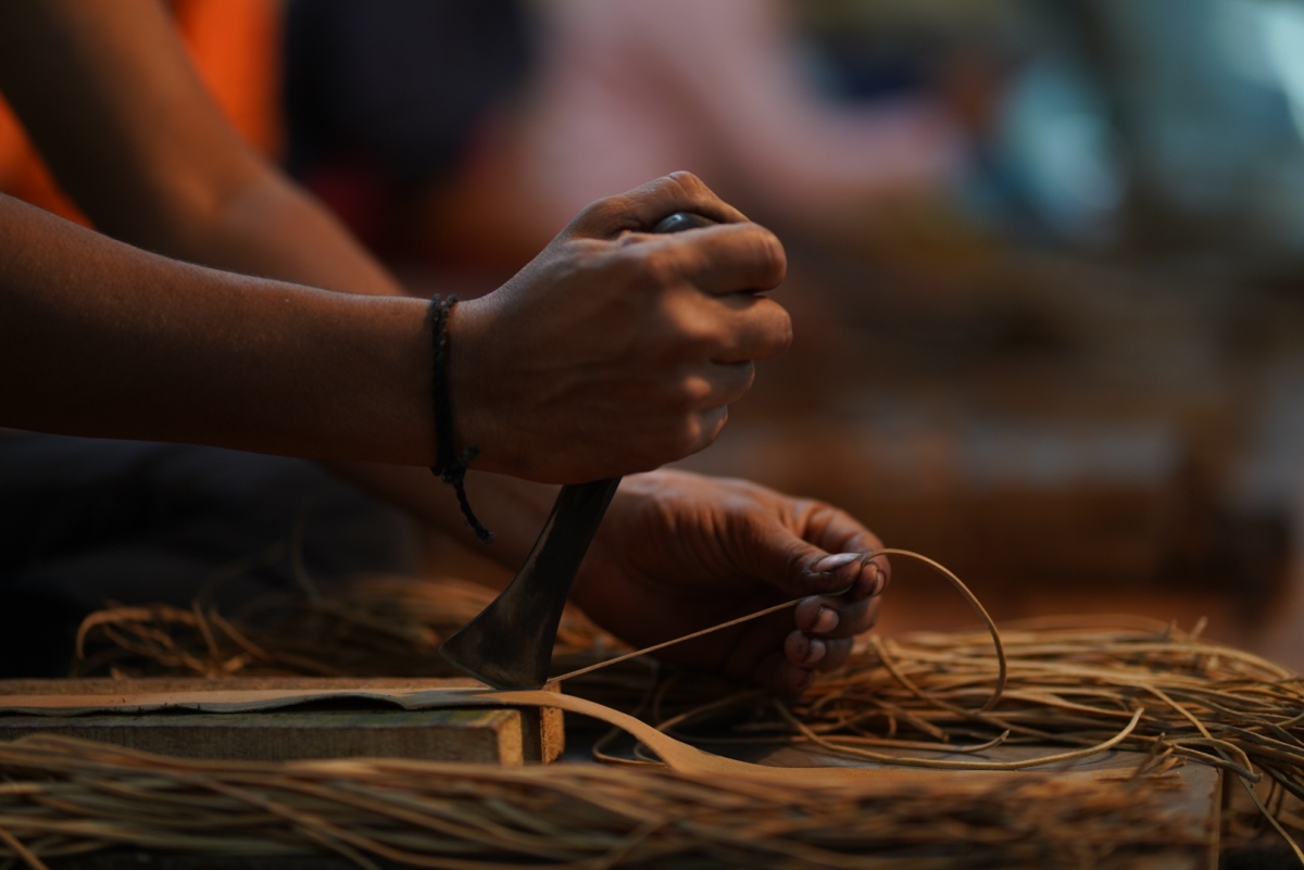 Workers making chappals